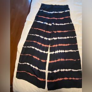 Small and silky navy blue pants 
Young, Fabulous and Broke